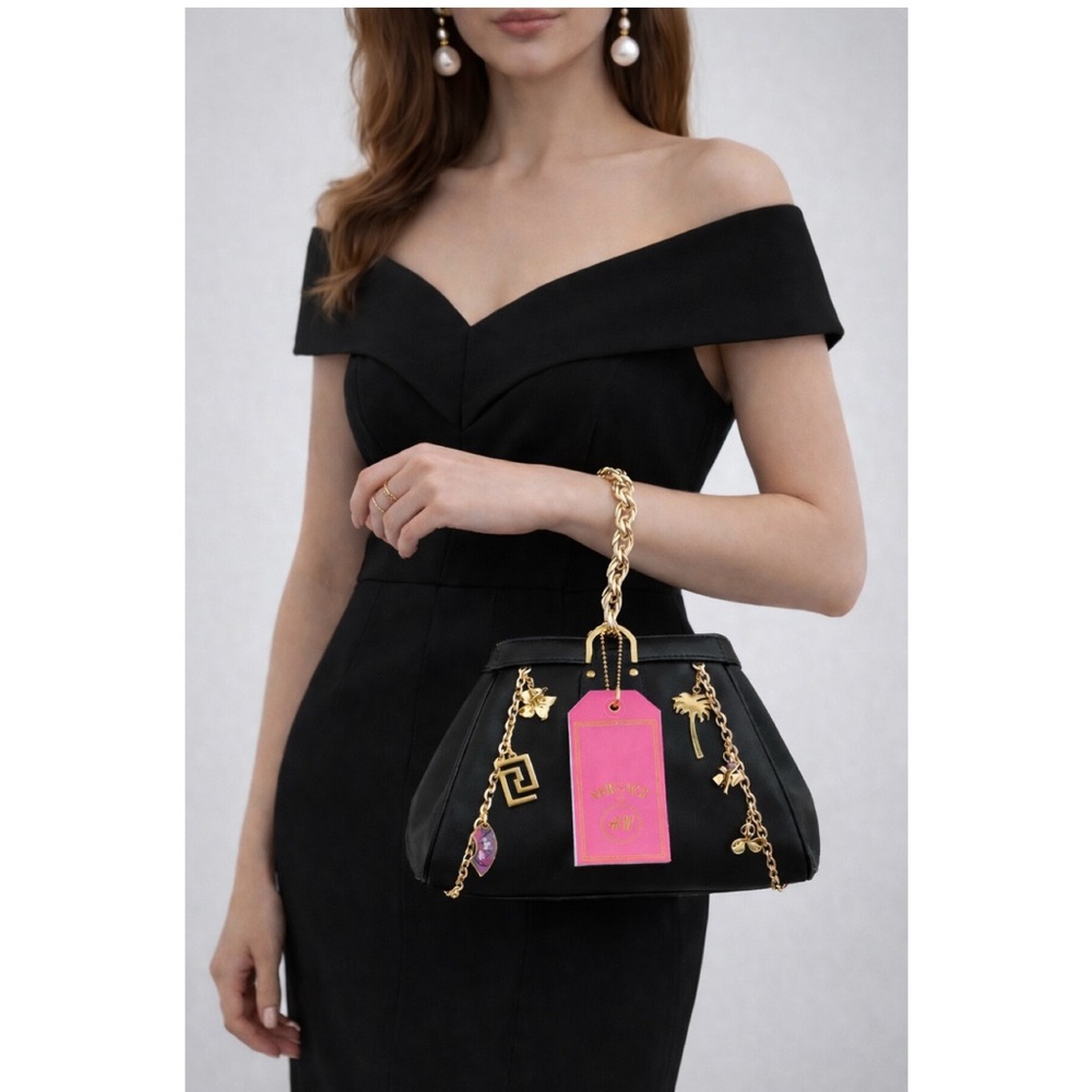 Versace black leather handbag with charms
